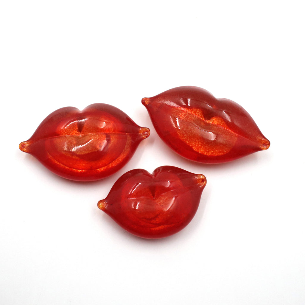 Handmade glass bright red lips.