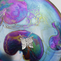 Butterfly on lily trail disc