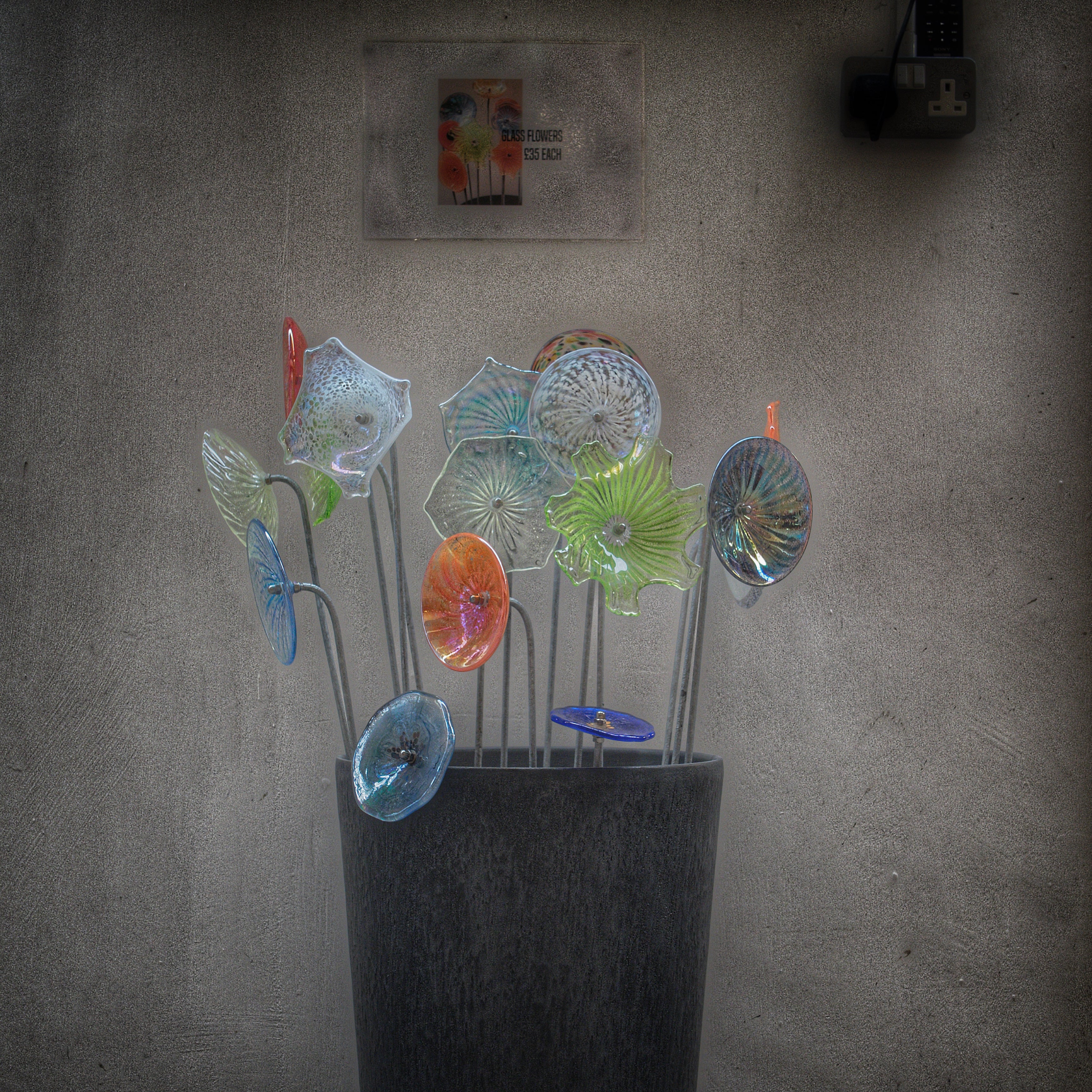 Glass flowers for sale in our gallery shop.