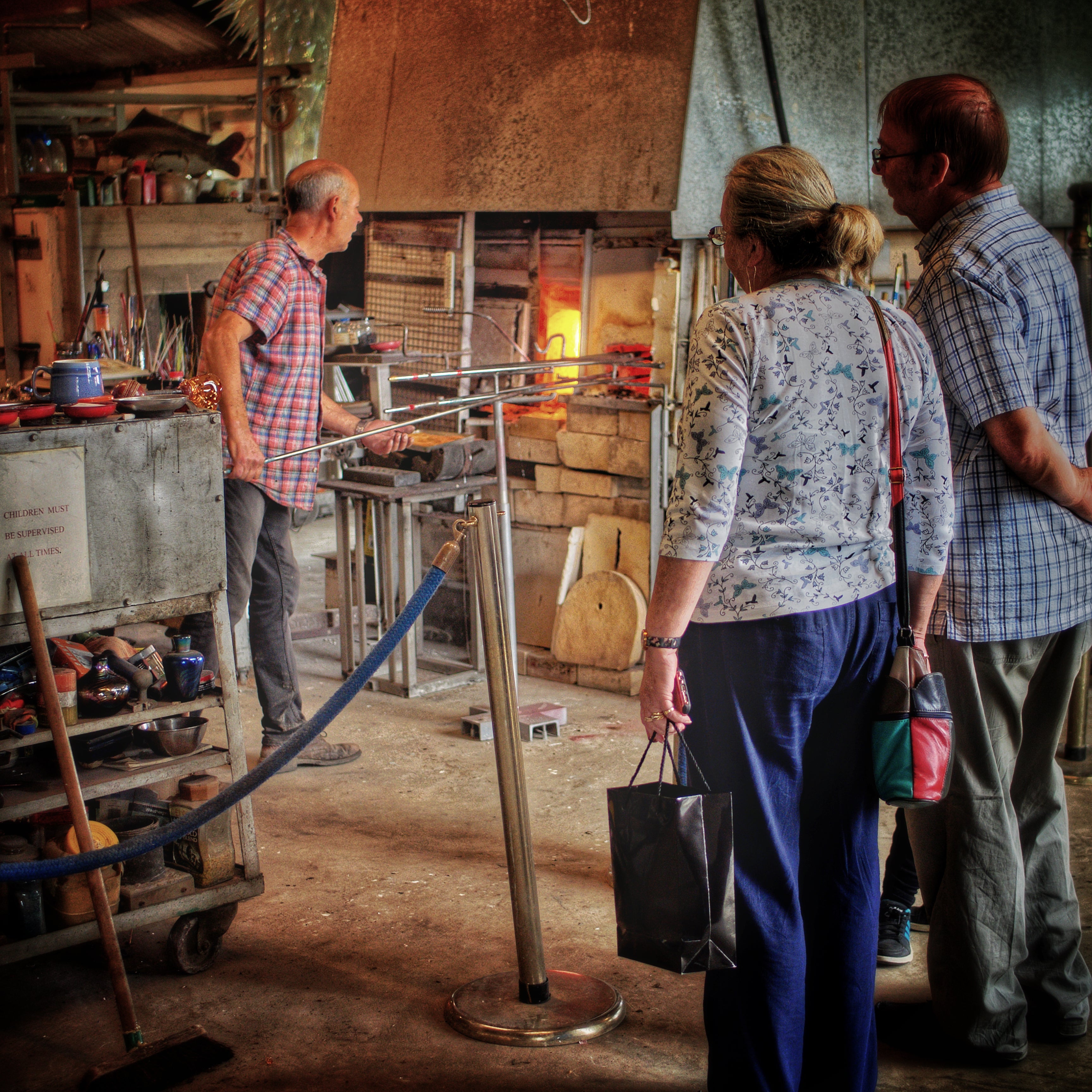 People are welcome to watch the glassblowers at work.