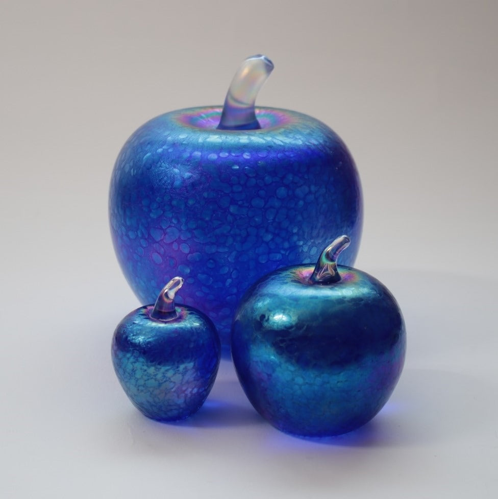 Set of handmade apples in cobalt blue iridescent