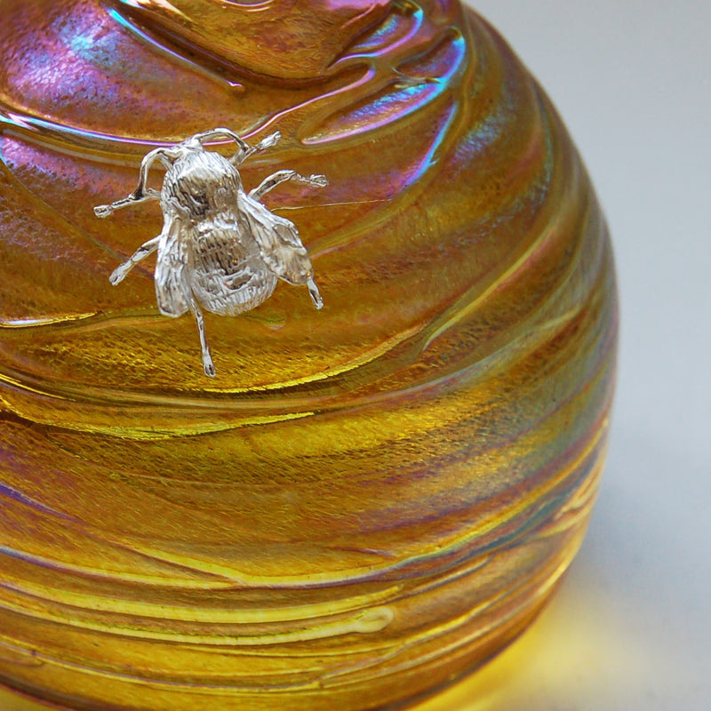 Glass skep beehive shaped paperweight with sterling silver bee close up