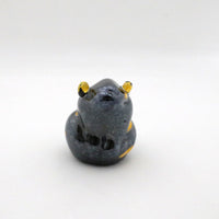 handmade black glass frog with yellow spots