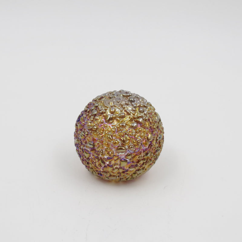 gold iridescent speckled glass paperweight