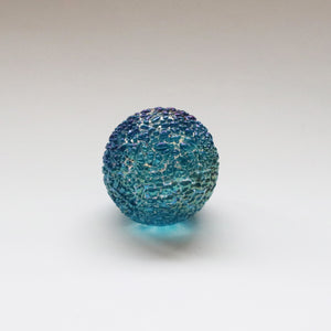 iridescent capriblue speckled paperweight