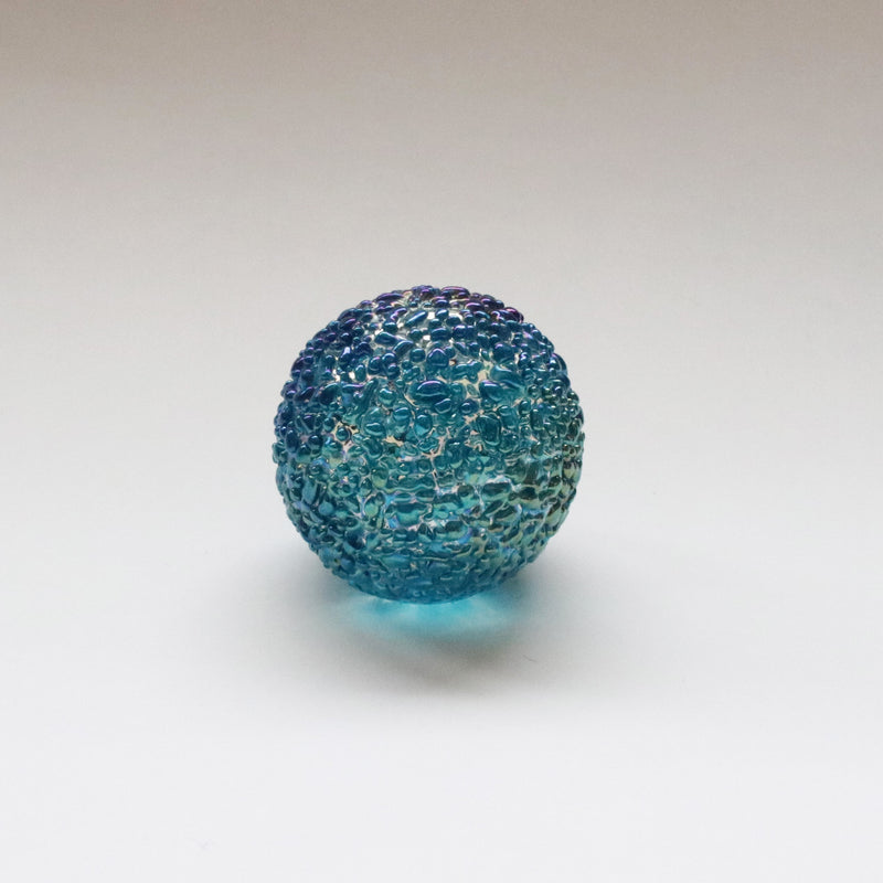 iridescent capriblue speckled paperweight