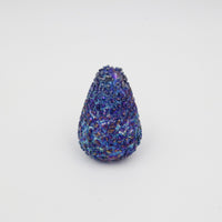 iridescent cobalt blue speckled conical shaped paperweight