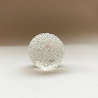giridescent glass speckled paperweight