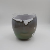 Handmade glass bowl in greens browns and wh